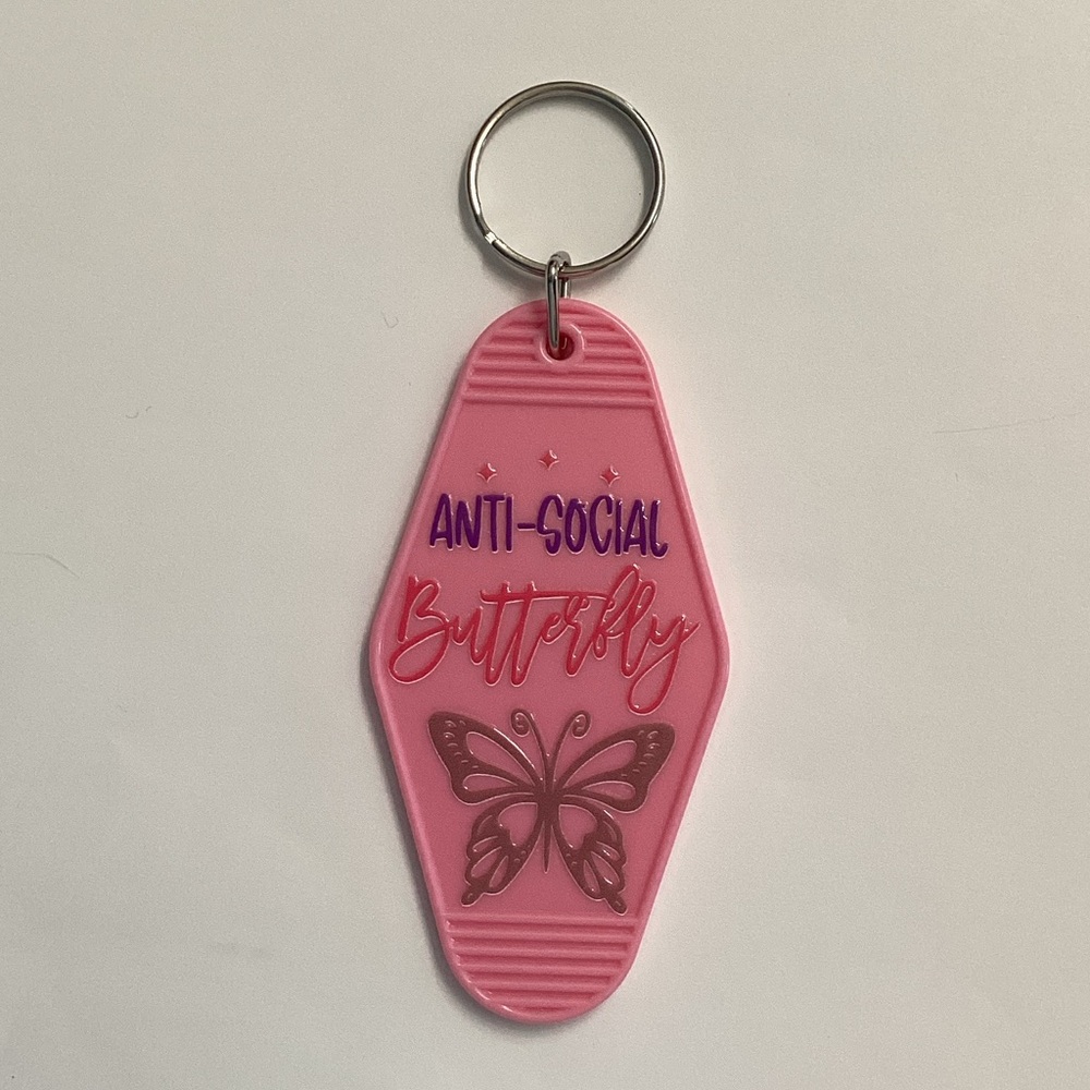 Pink Keychain with Butterfly Design